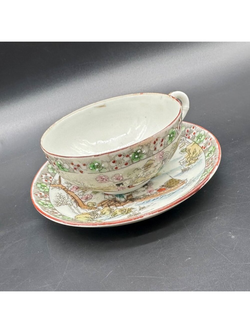 Antique Nippon Porcelain Teacup and Saucer Moriage Hand Painted Geisha Ware